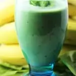 Healthy spinach banana mint smoothie basil garnish