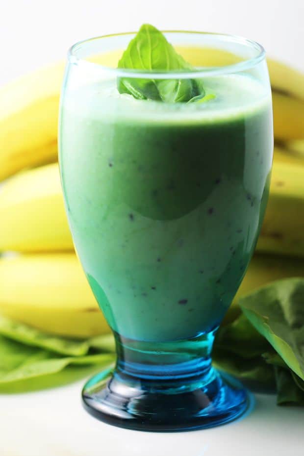 Healthy spinach banana mint smoothie basil garnish