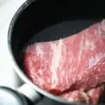 corned beef brisket soaking in water