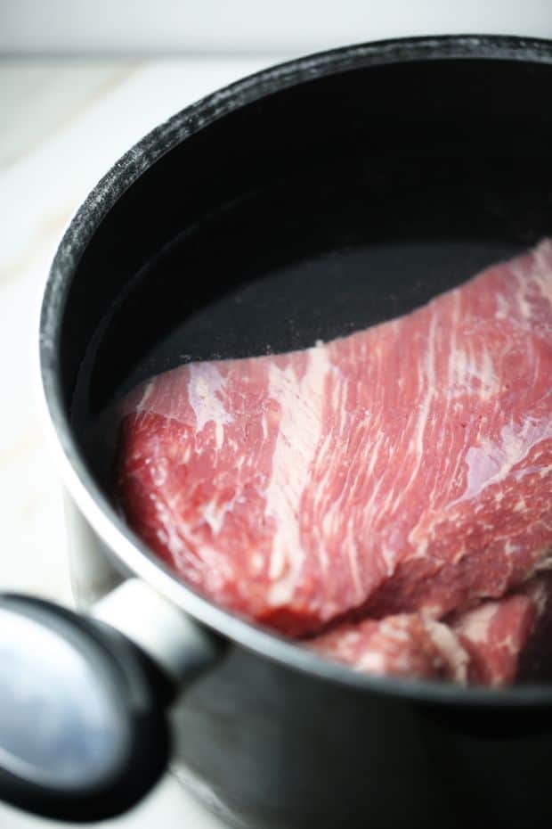 corned beef brisket soaking in water