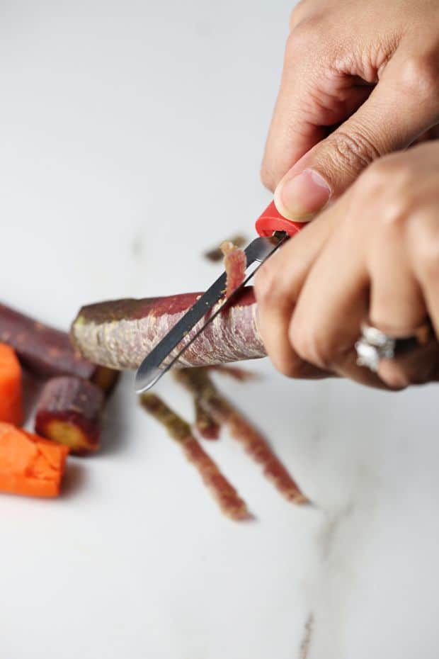 Healthy Multi-colored Carrot salad peeling